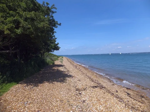 An image depicting the trail Norton to Cowes Walk and its surrounding area.