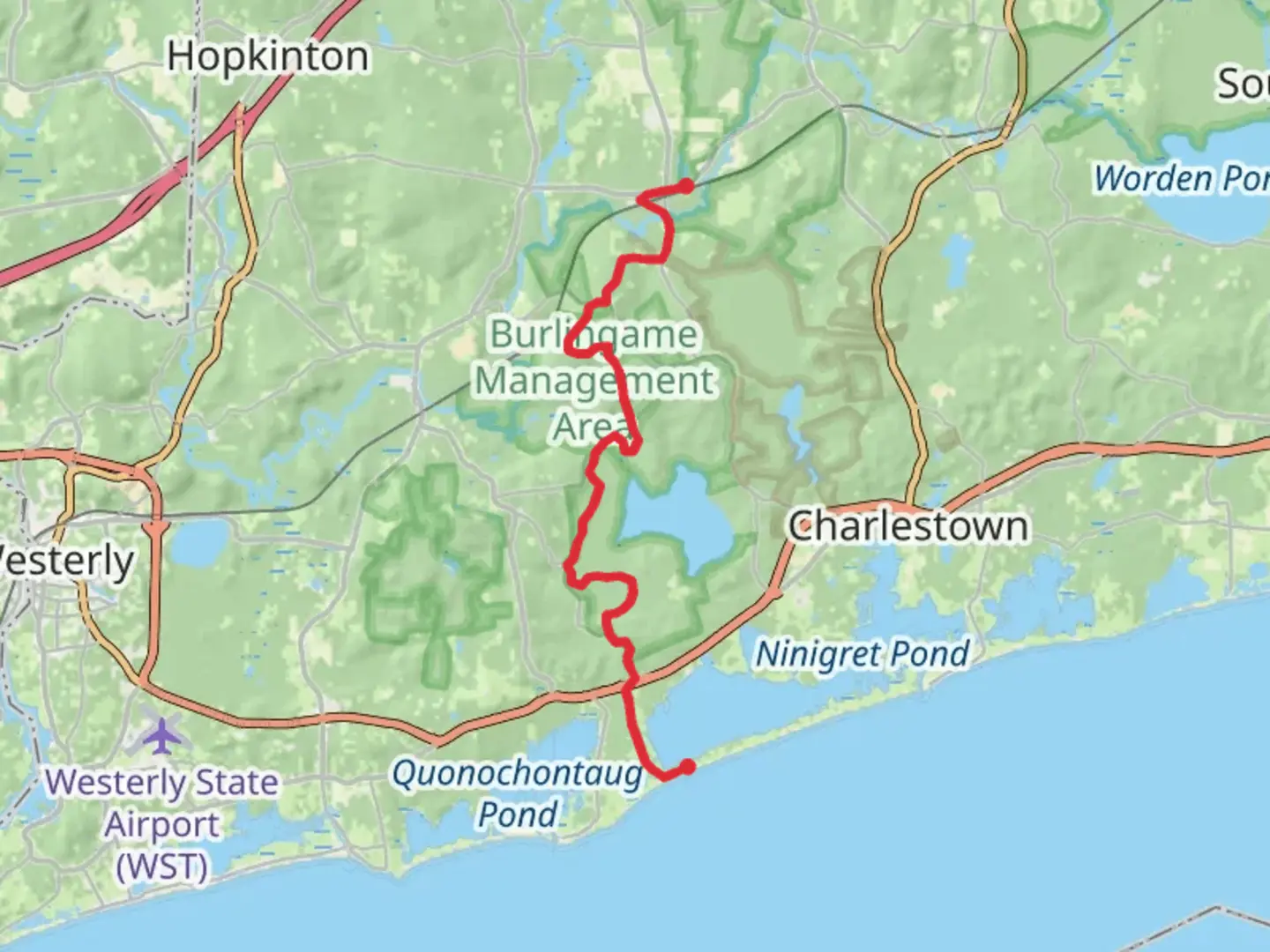 An image depicting the trail Quonochontaug to Wood River Junction via North South Trail and its surrounding area.