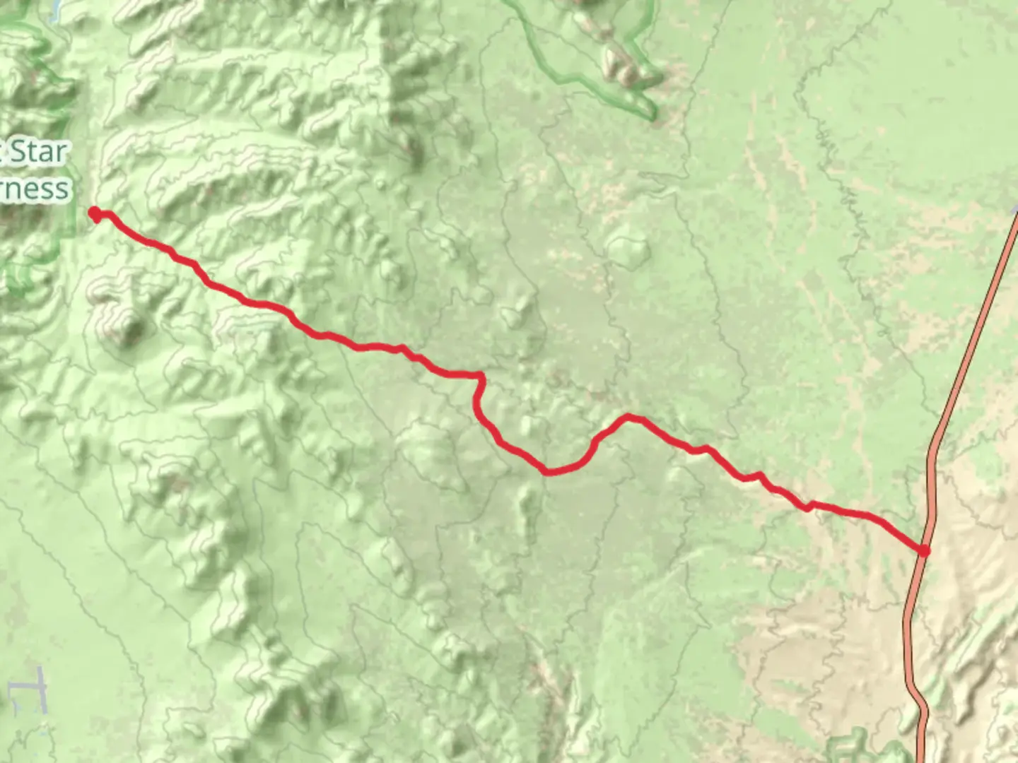 An image depicting the trail Dove Spring Canyon Road and its surrounding area.