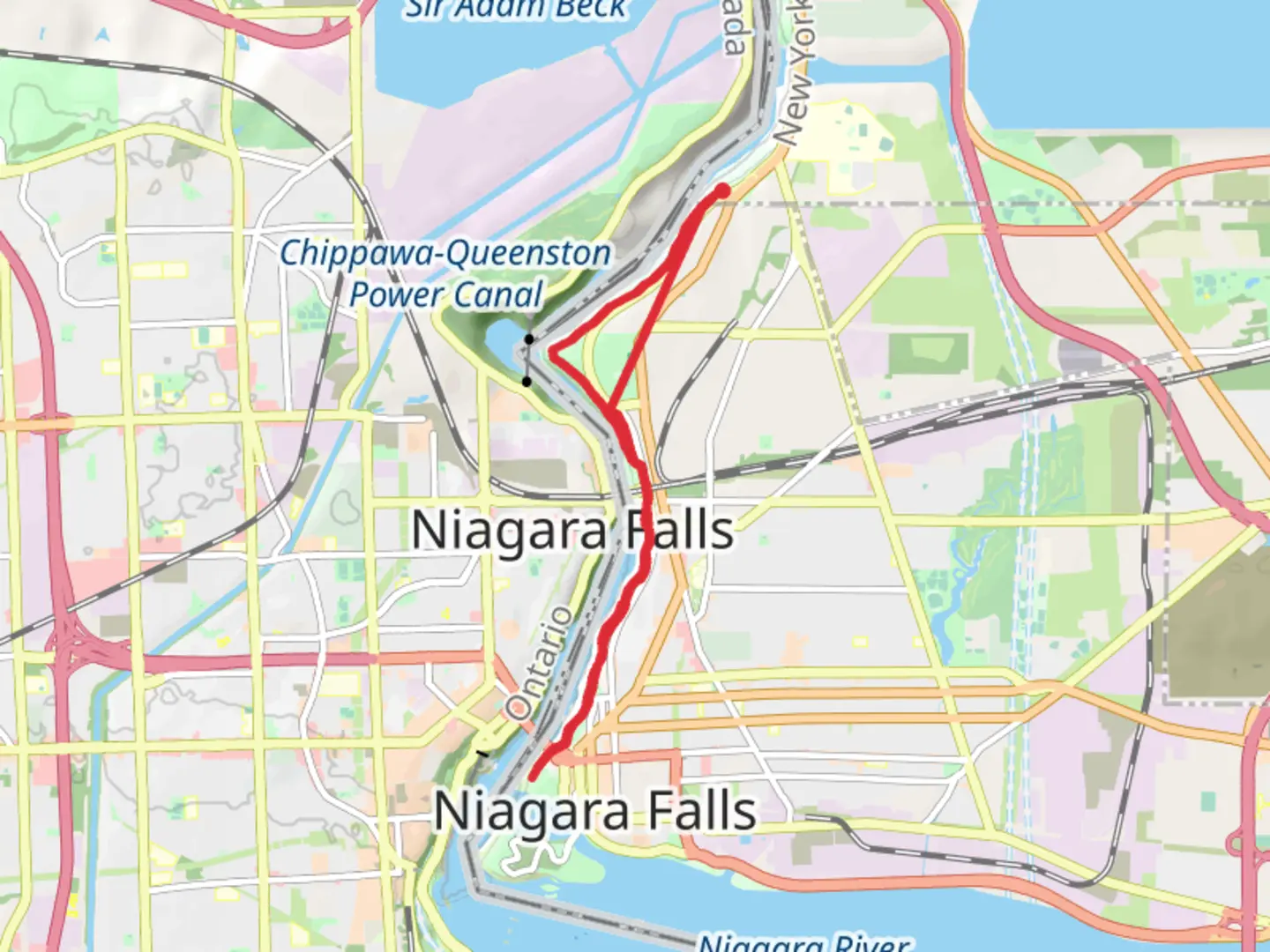 An image depicting the trail Niagara Falls State Parks Trail and its surrounding area.
