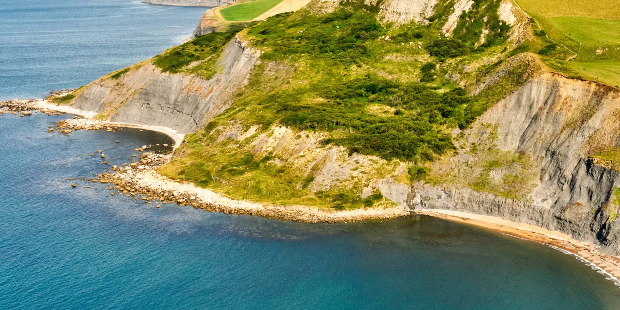 An image depicting the trail Tom's Field to Chapman's Pool Walk and its surrounding area.