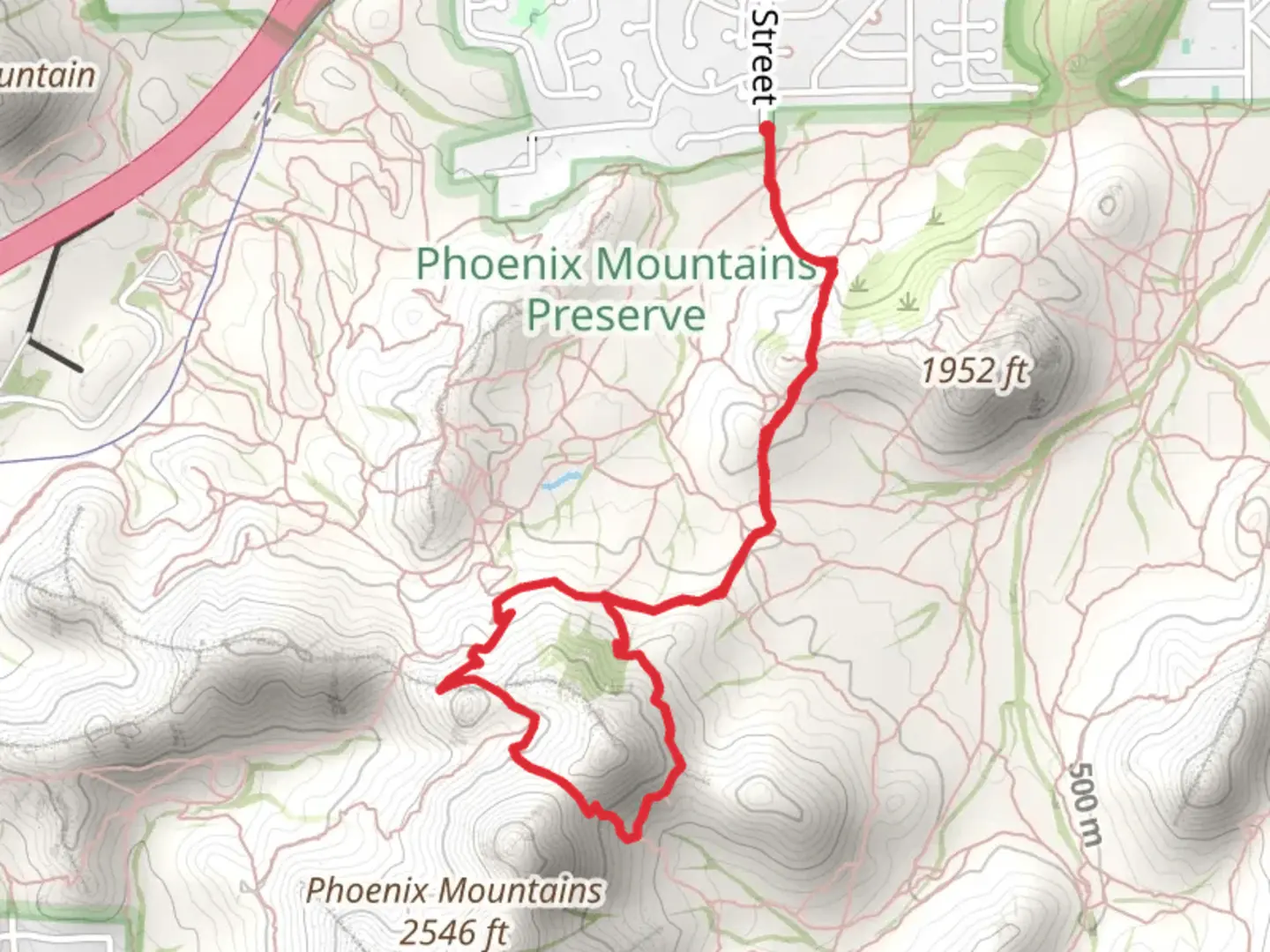 An image depicting the trail VOAZ Loop Trail from East Puget Avenue and its surrounding area.