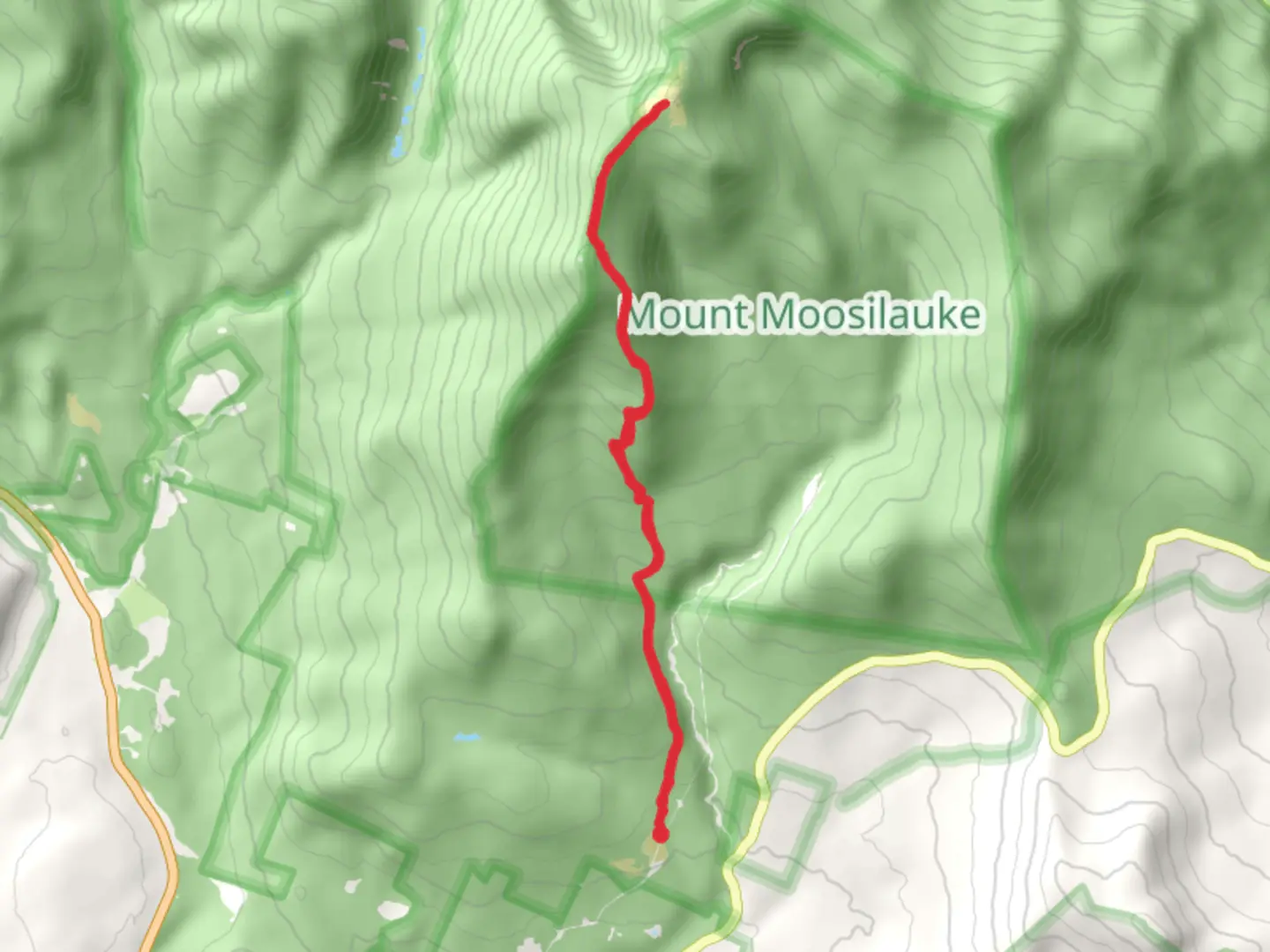 An image depicting the trail Mount Moosilauke from Breezy Point and its surrounding area.