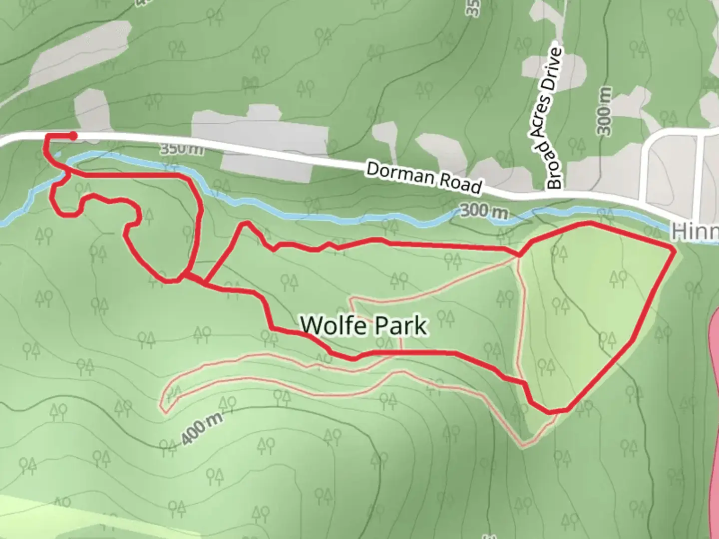 An image depicting the trail Wolfe Park Loop Trail and its surrounding area.