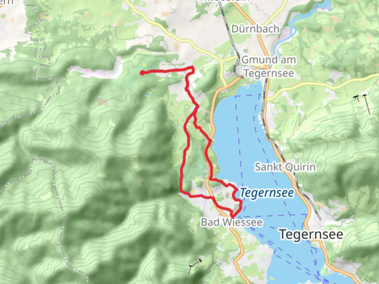 An image depicting the trail Seepromenade Loop via Gmund Bad Wiessee and its surrounding area.