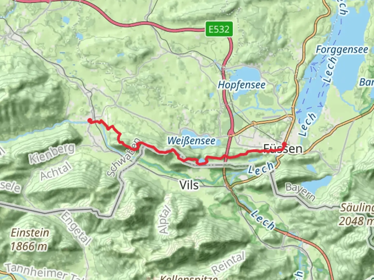 An image depicting the trail Fussen to Pfronten Walk via Alatsee and its surrounding area.