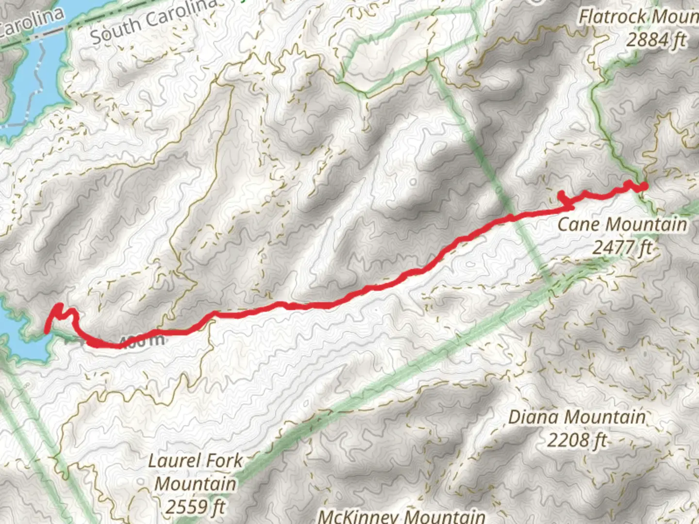 An image depicting the trail Lake Jocassee via Laurel Fork Creek Road and its surrounding area.