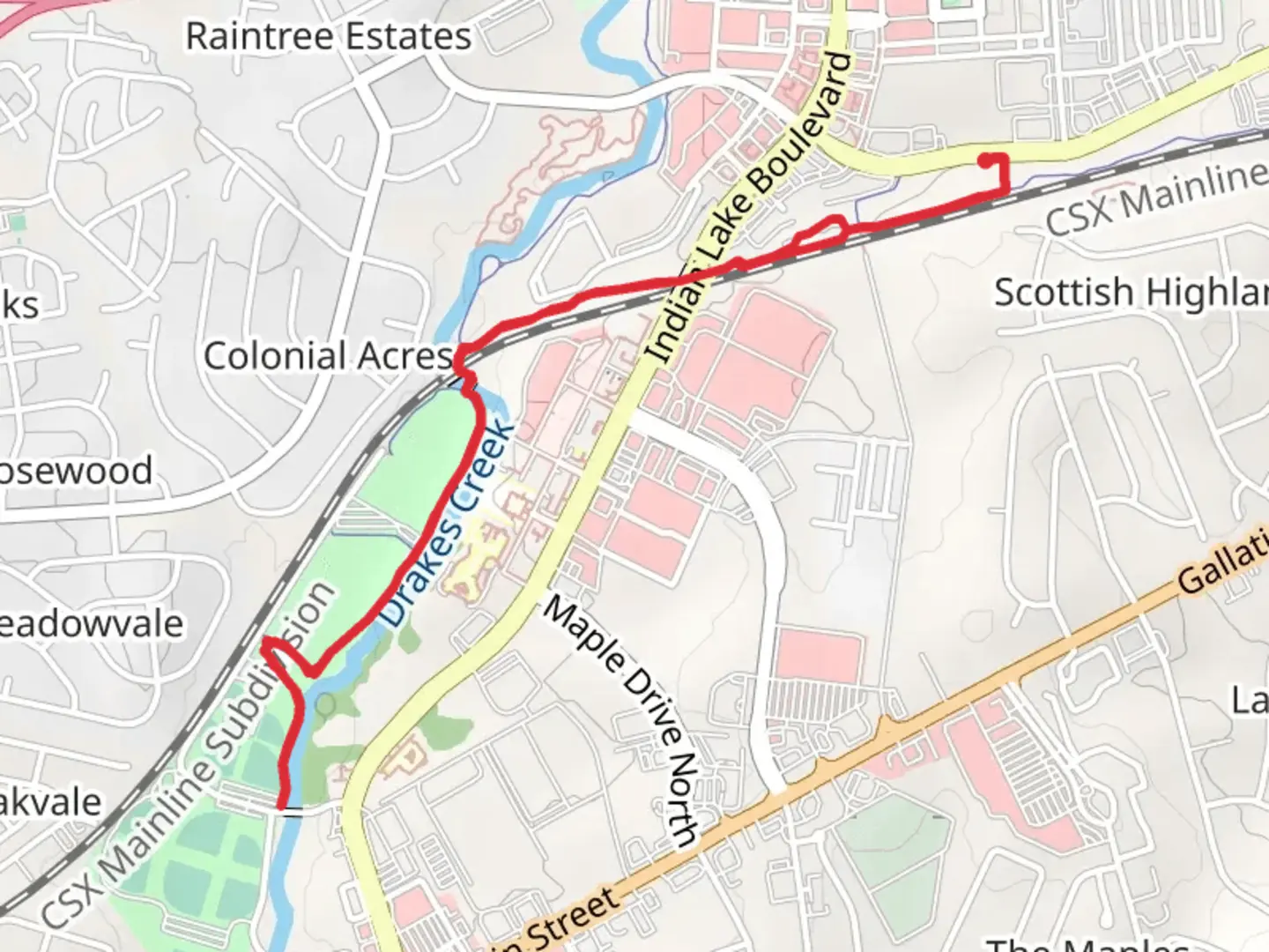An image depicting the trail Hendersonville Greenway and its surrounding area.