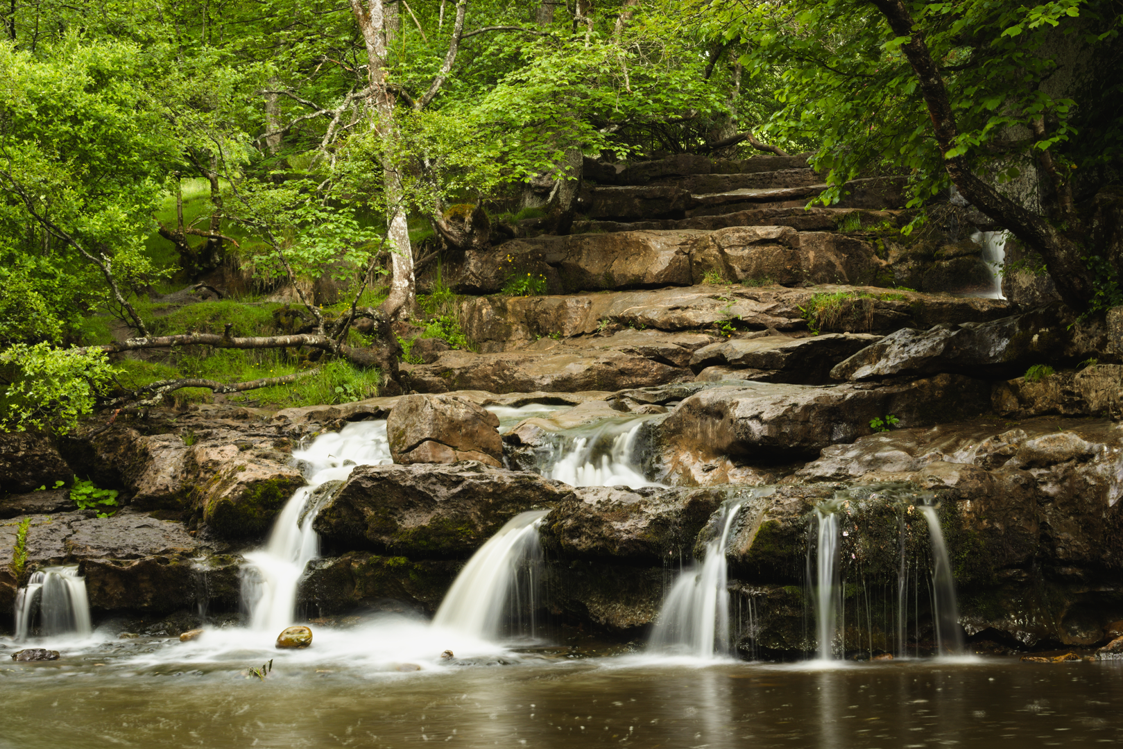 An image depicting the trail Keld and the River Swale Waterfalls and its surrounding area.