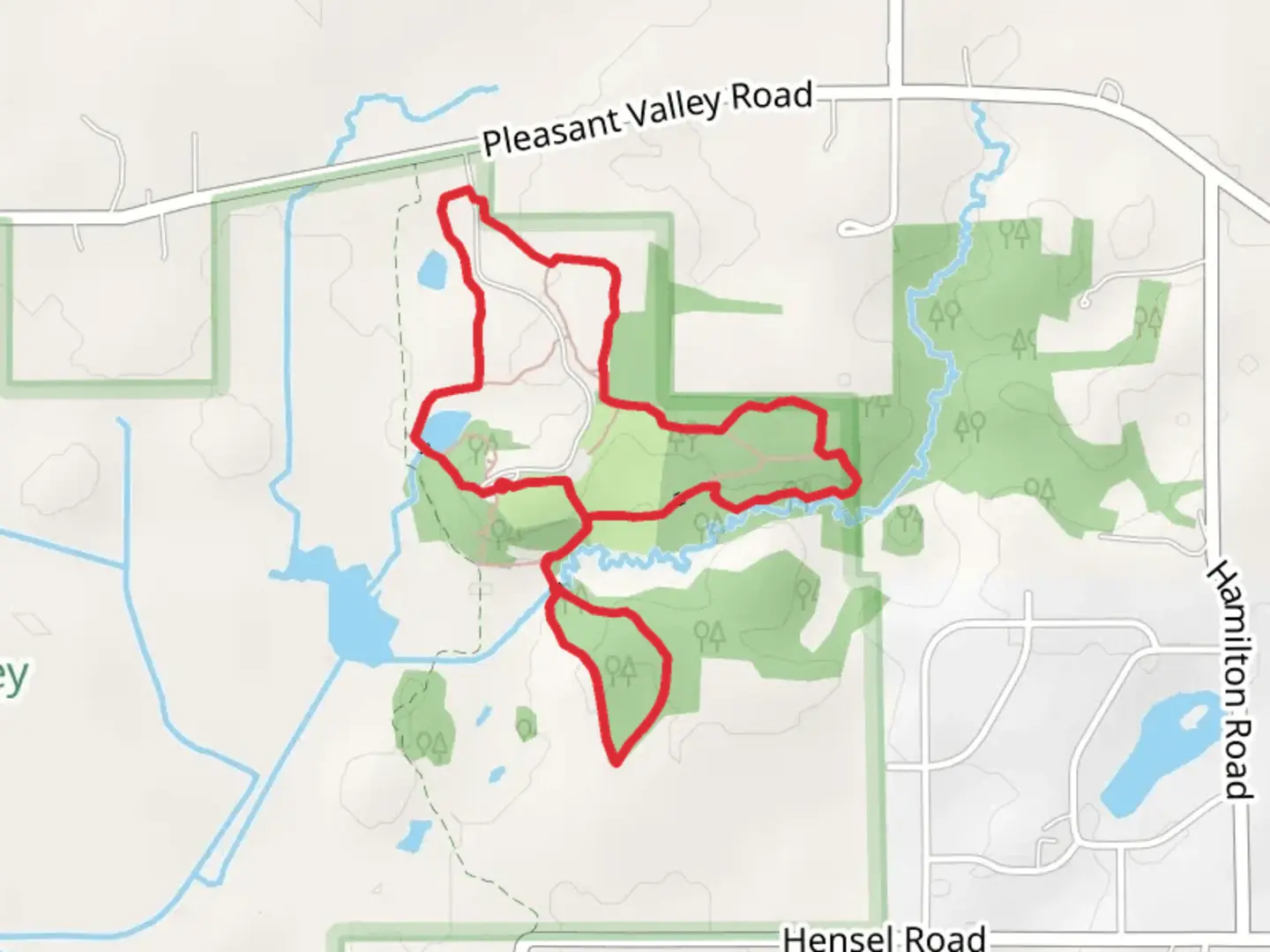 An image depicting the trail Hiking Path and Nature Loop Trail and its surrounding area.