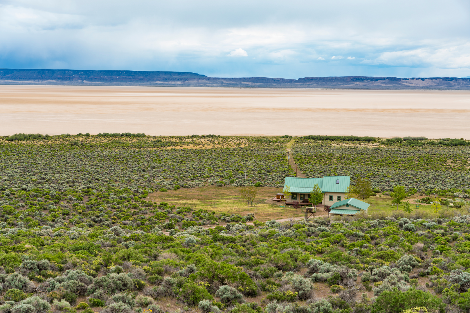 An image depicting the trail Steens Mountain Gorge Loop and its surrounding area.