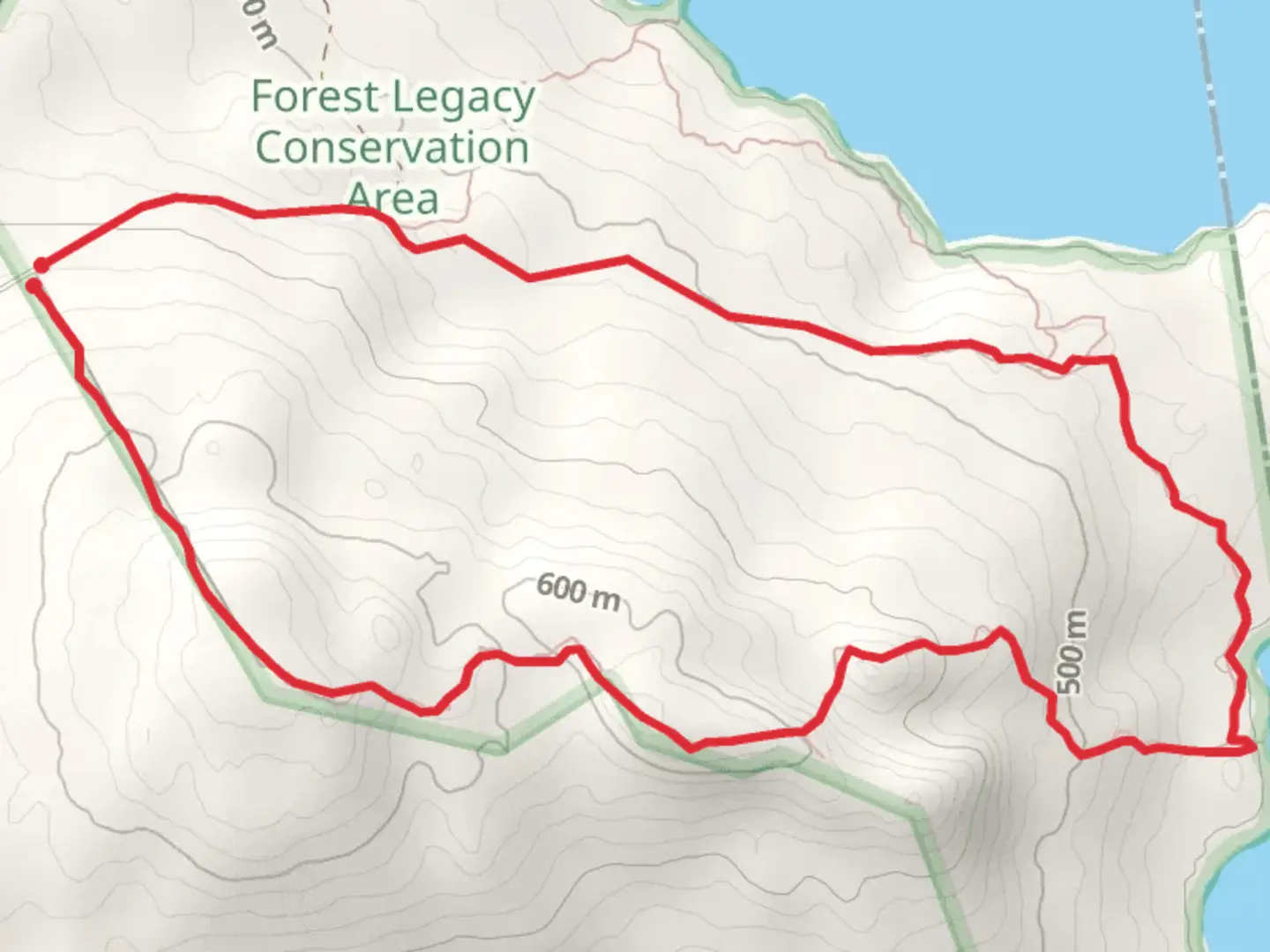 An image depicting the trail Maine Hill from Mud Pond Road and its surrounding area.