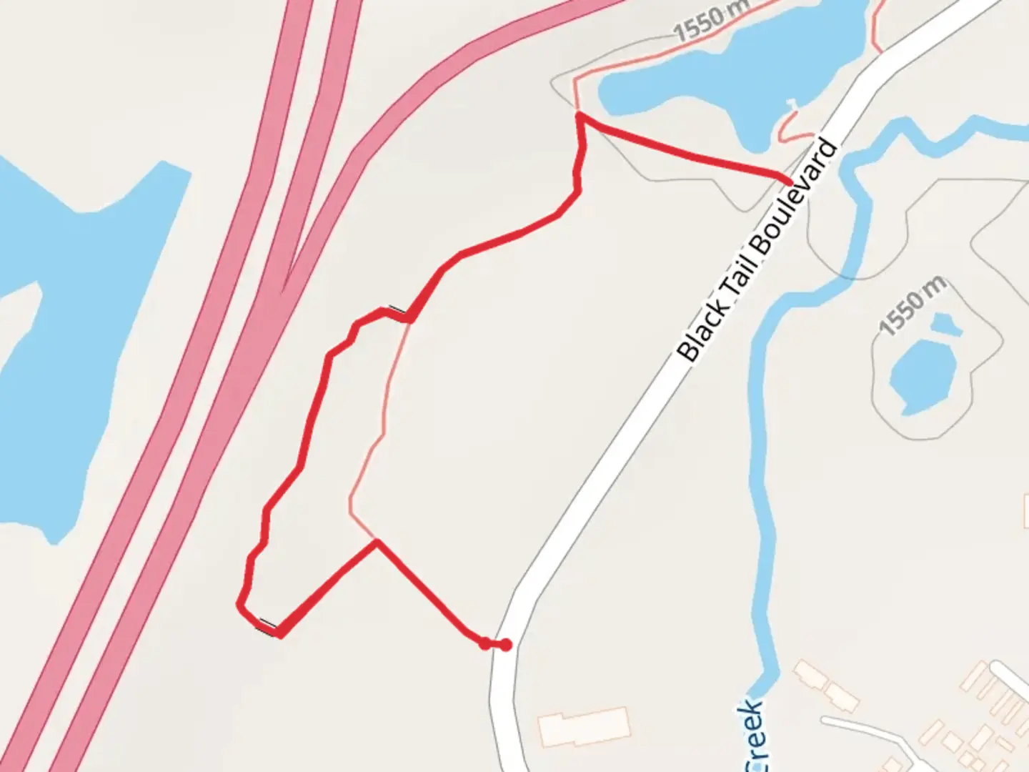 An image depicting the trail Black Tail Boulevard West Walk and its surrounding area.