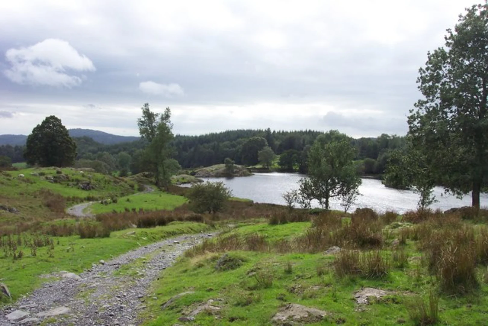An image depicting the trail Hill Top to Moss Eccles Tarn Walk and its surrounding area.