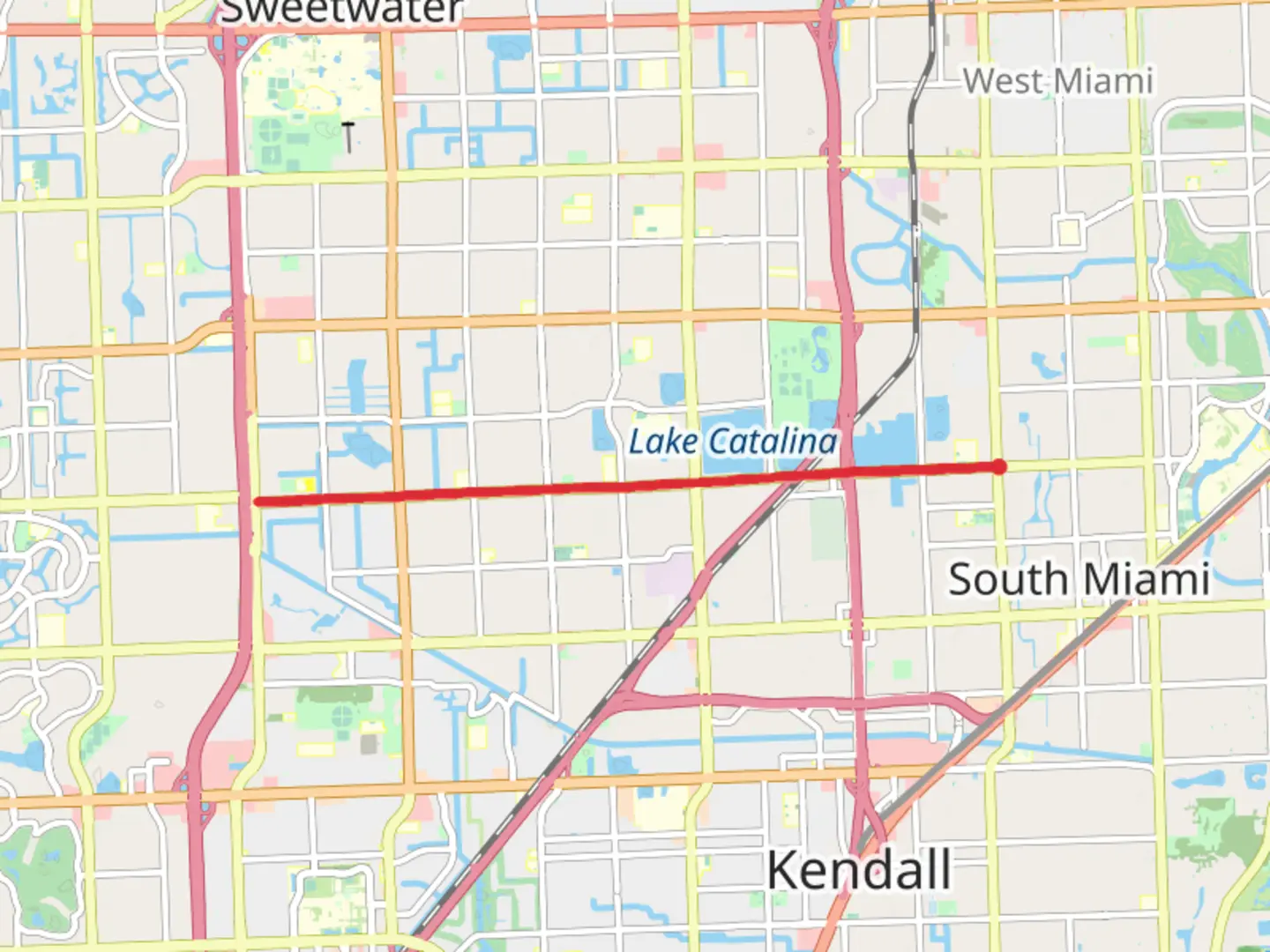 An image depicting the trail Miller Drive Green and White Path from Southwest 67th Street and its surrounding area.