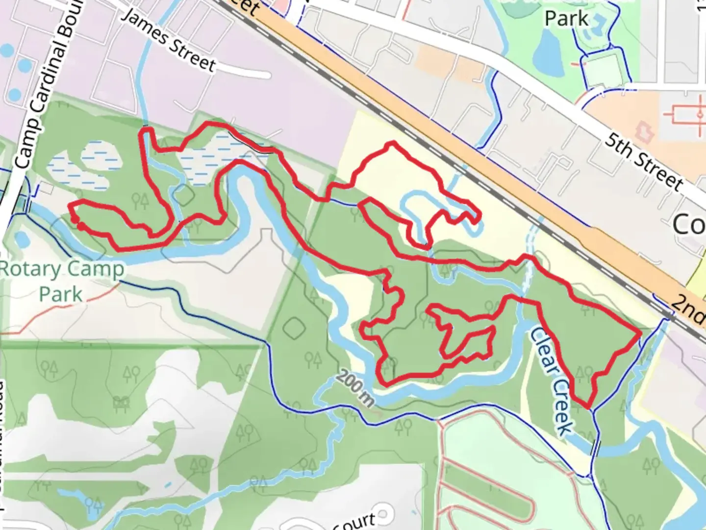 An image depicting the trail Woodpecker and Clear Creek Trail Loop and its surrounding area.