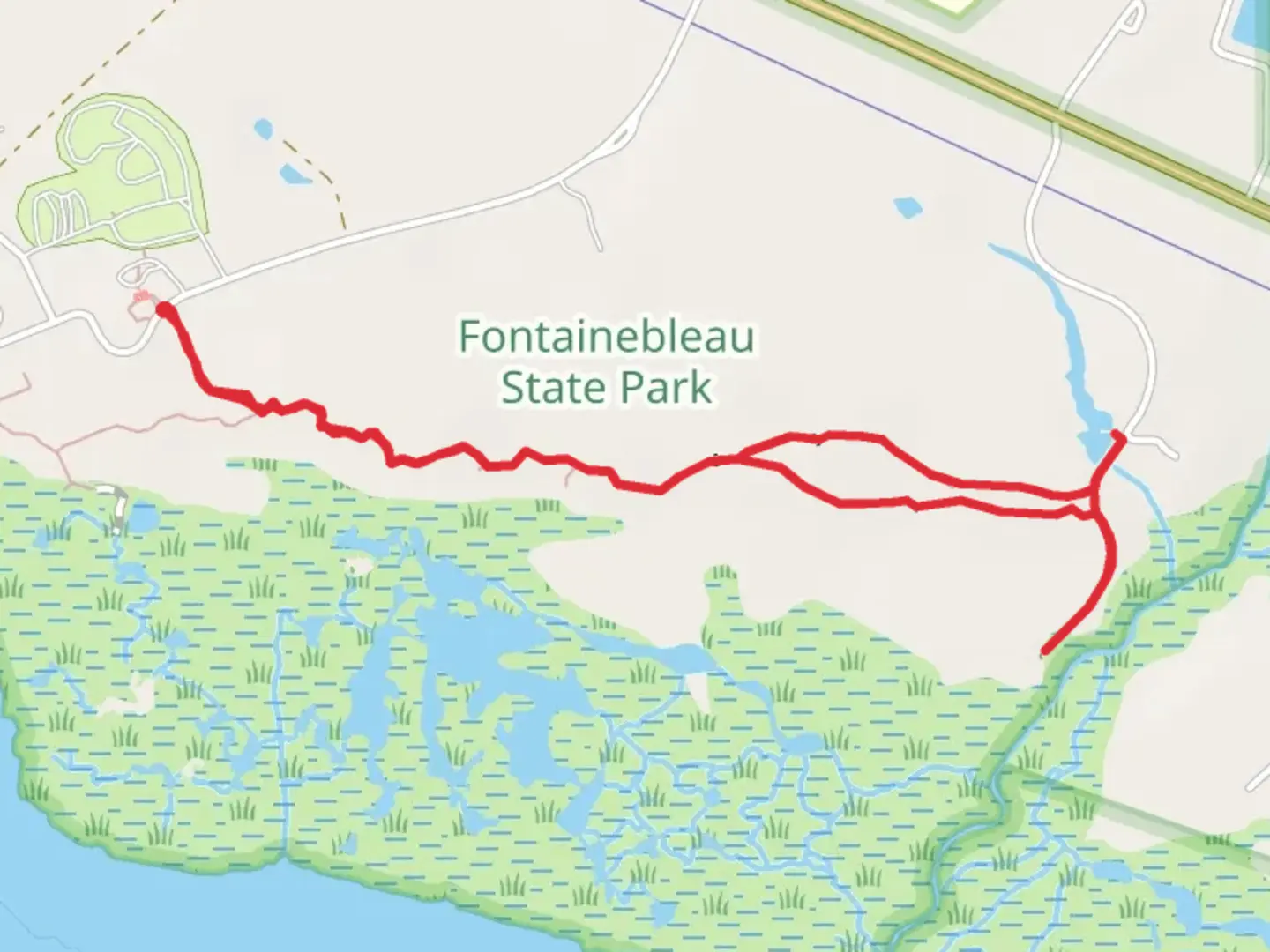 An image depicting the trail Cane Bayou Trail and its surrounding area.