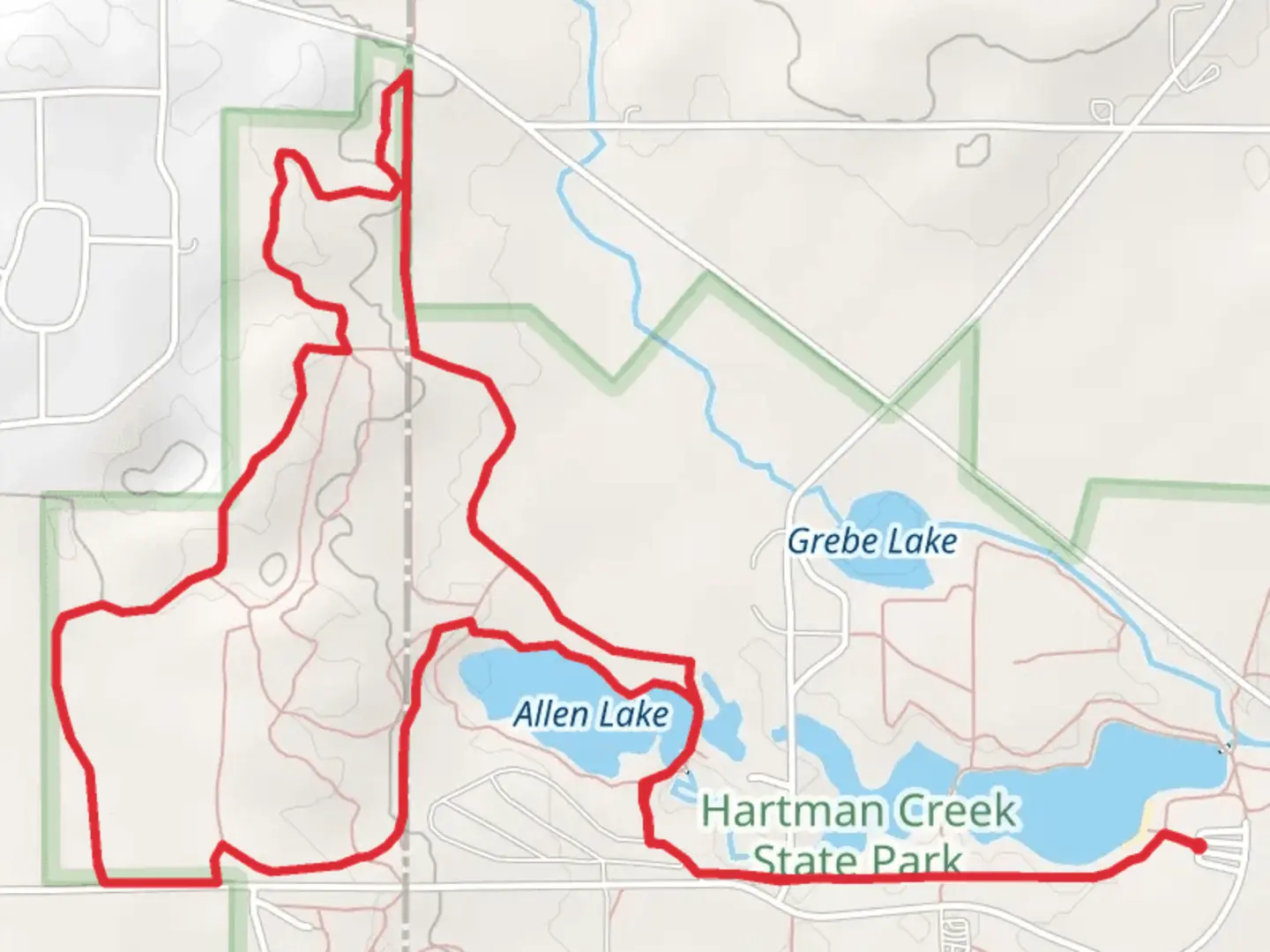 An image depicting the trail Alle Lake and Ice Age Loop Trail and its surrounding area.