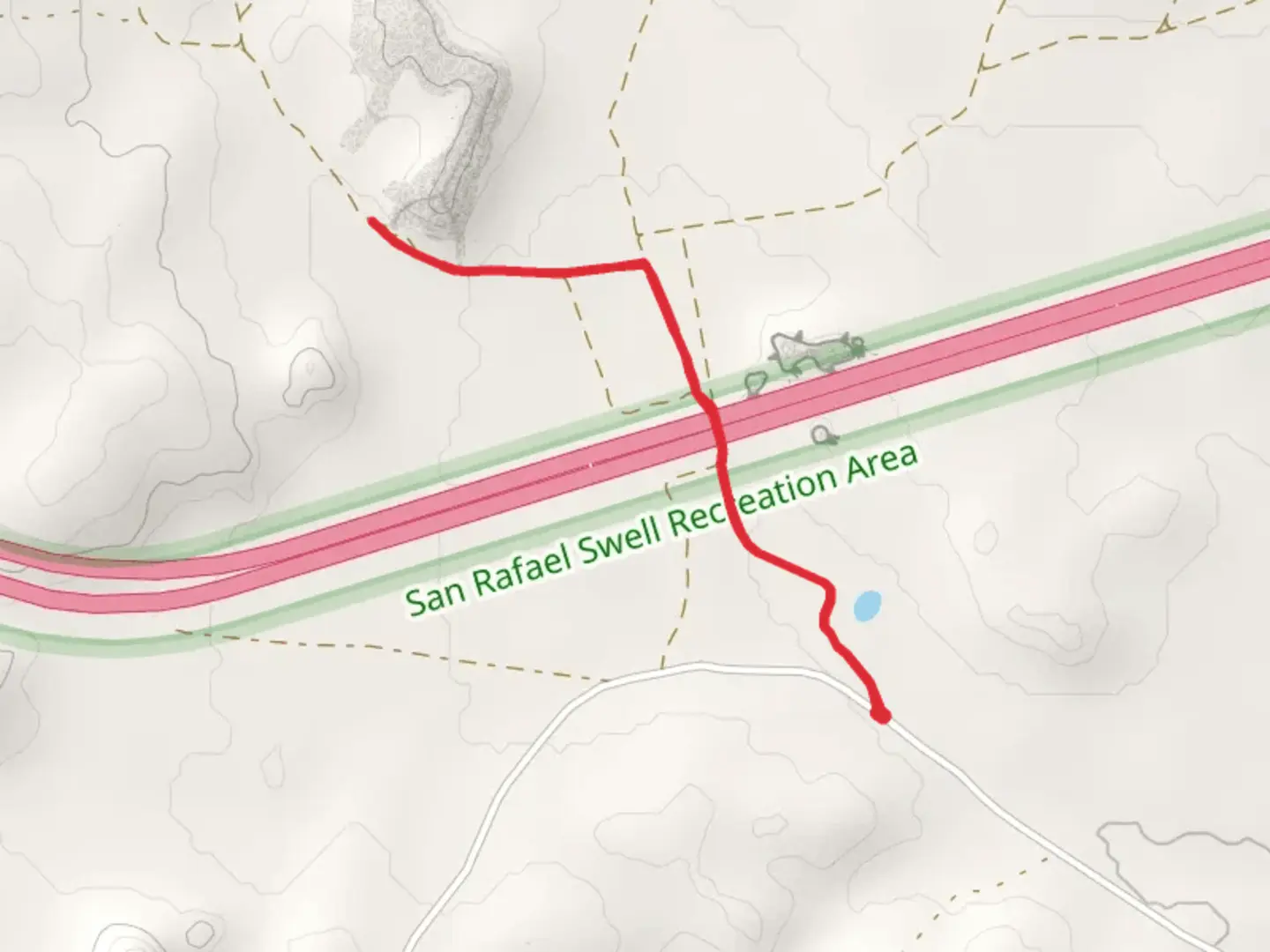 An image depicting the trail Dutchman Arch and its surrounding area.