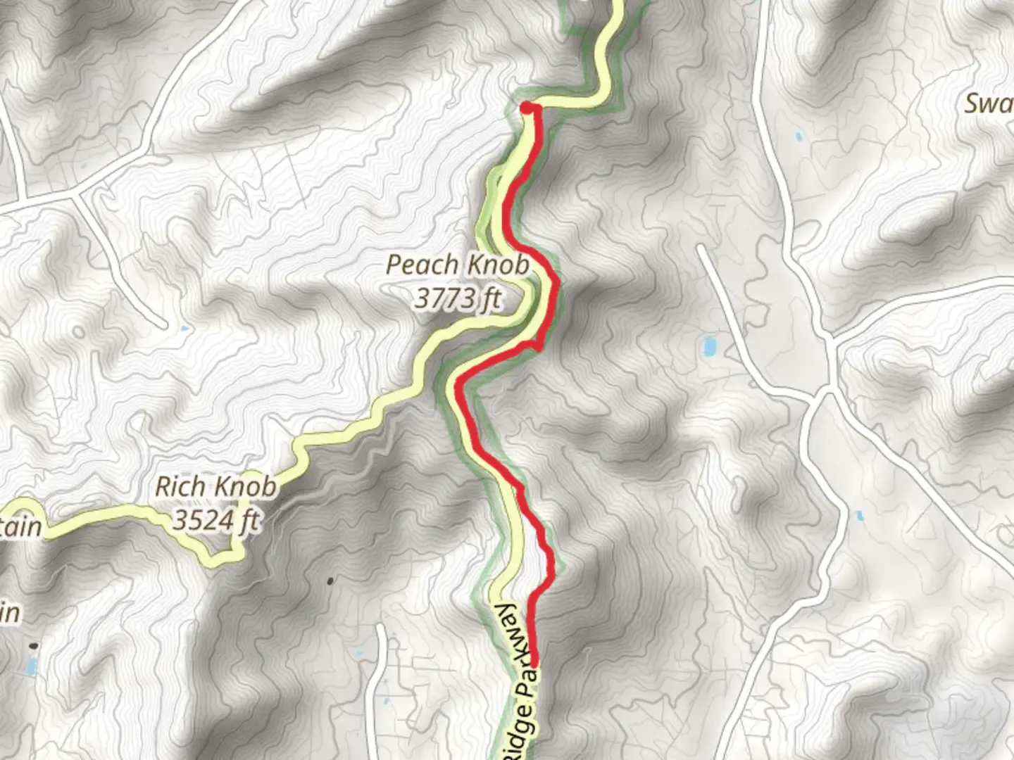 An image depicting the trail Mountains to Sea Trail Out and Back and its surrounding area.