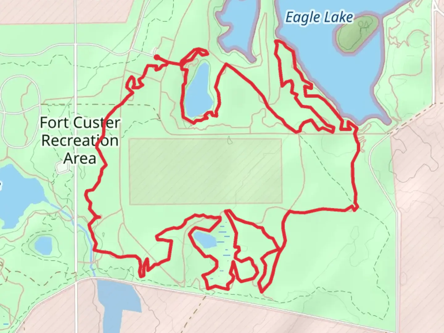 An image depicting the trail Red Trail and Yellow Trail Loop - Eagle Lake and its surrounding area.