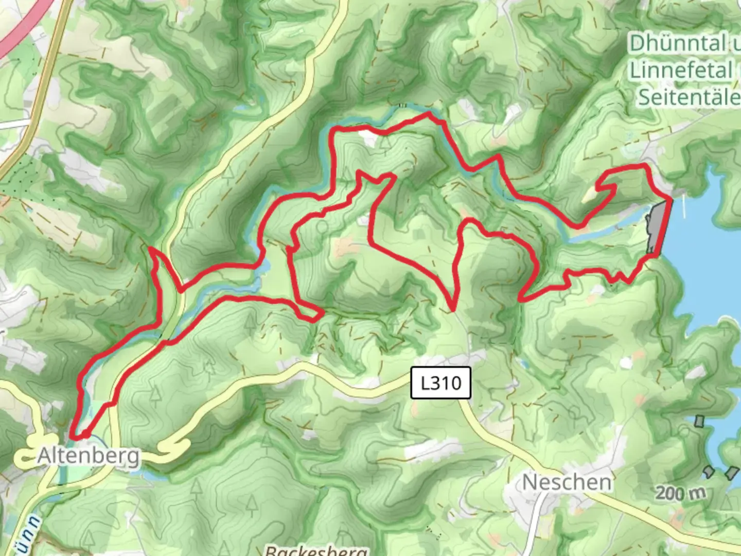 An image depicting the trail Altenberg and Lindscheid Loop via Grobe Dhunntalsperre and its surrounding area.