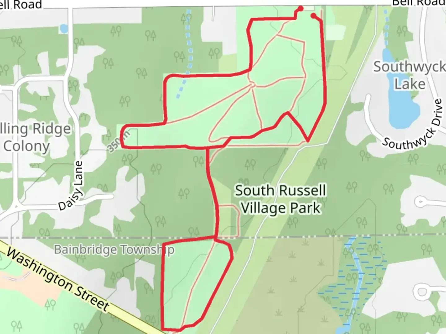 An image depicting the trail South Russell Village Park Loop and its surrounding area.