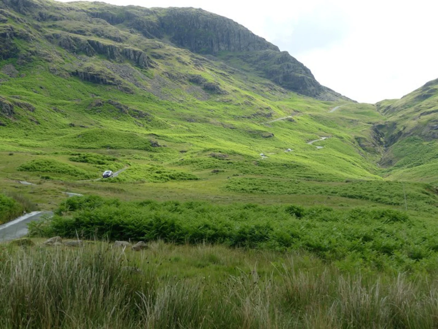 An image depicting the trail Harter Fell Loop via Hardknott Pass and its surrounding area.