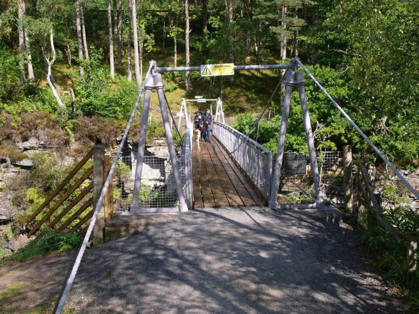 An image depicting the trail Corrieshalloch Gorge Walk and its surrounding area.
