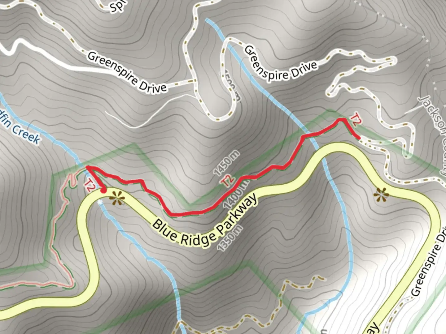 An image depicting the trail Woodfin Creek via Mountains-to-Sea Trail Out and Back and its surrounding area.