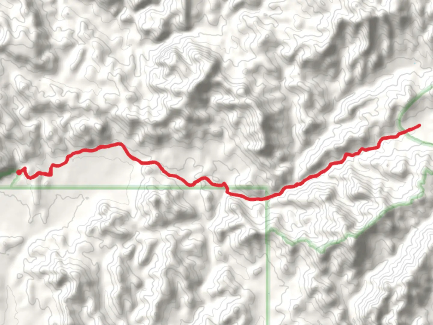 An image depicting the trail Miners Needle via Coffee Flat Trail and its surrounding area.