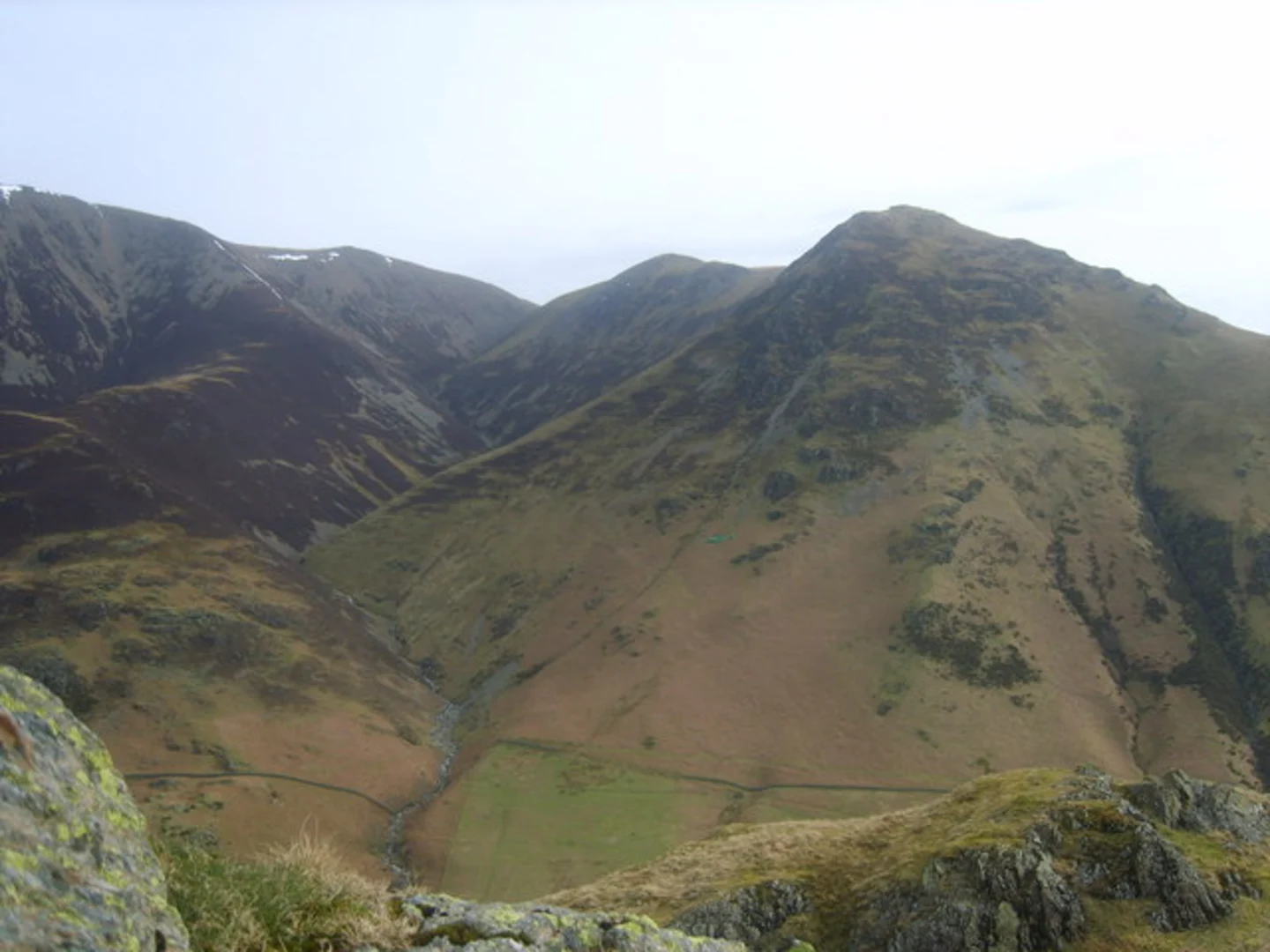 An image depicting the trail Rannerdale Beck Streamside Walk and its surrounding area.