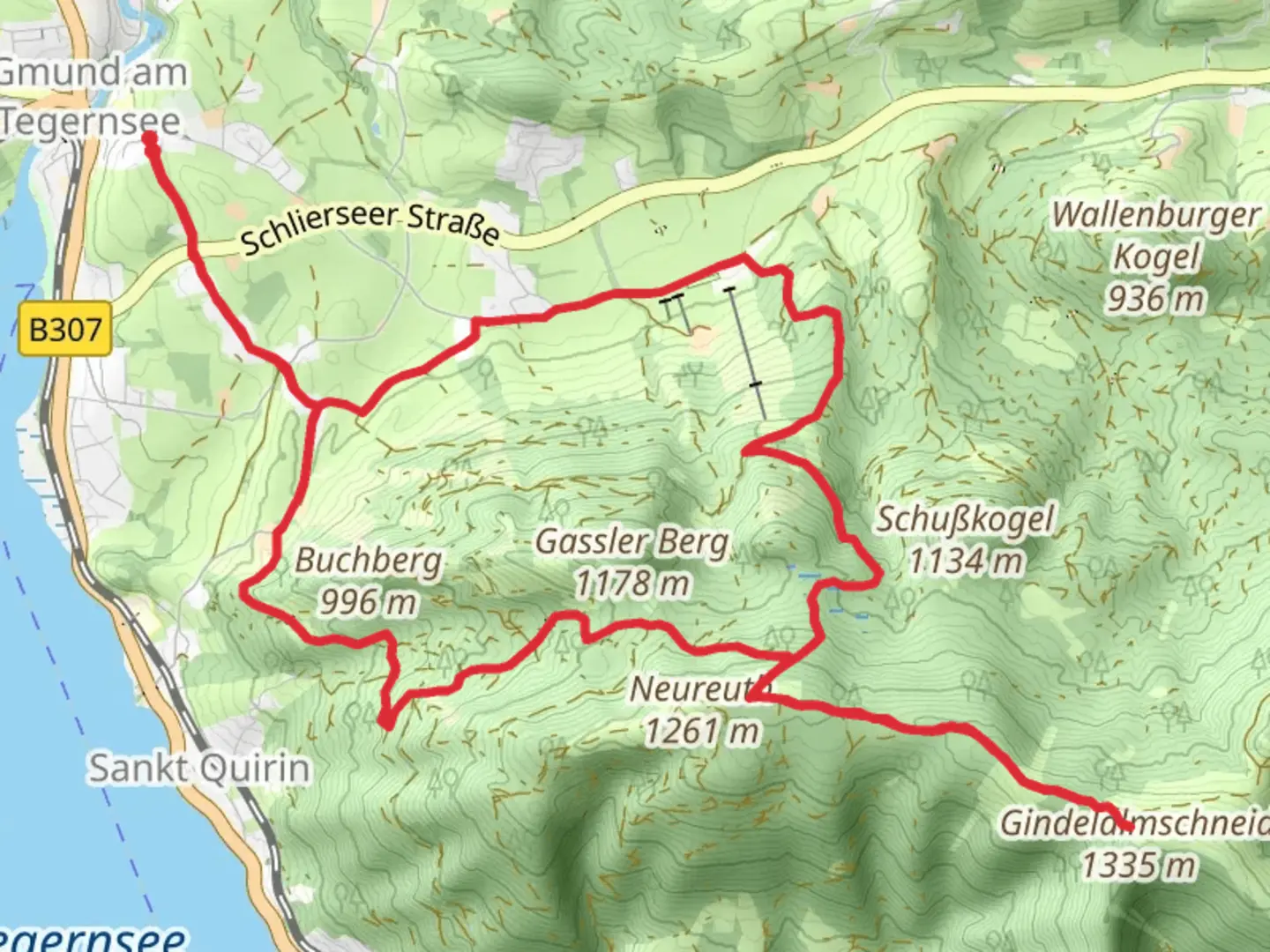 An image depicting the trail Gmund am Twegernsee and Gindelalmschneid Loop and its surrounding area.