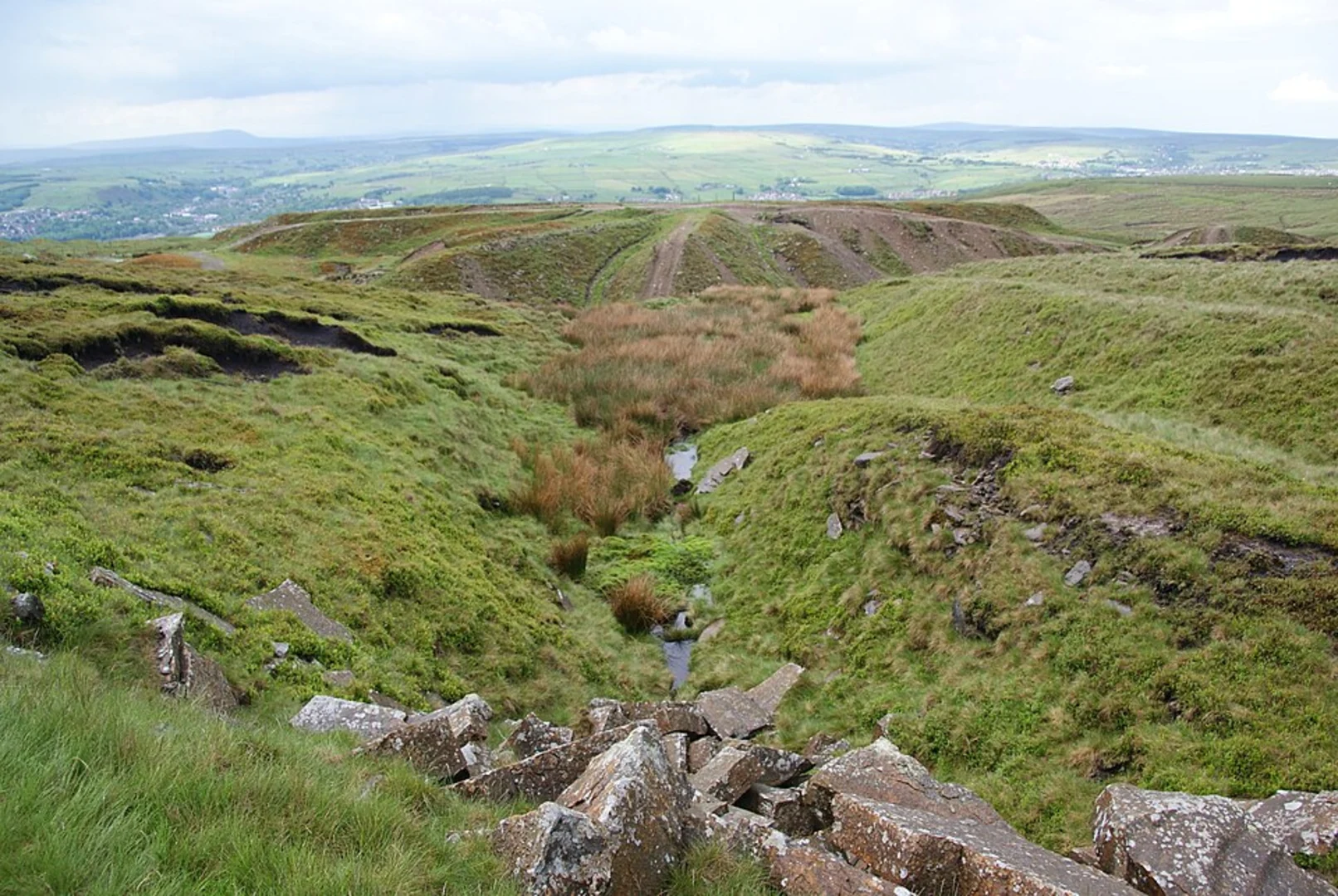 An image depicting the trail Rossendale Way Commemorative Stone and Cragg Quarry and its surrounding area.
