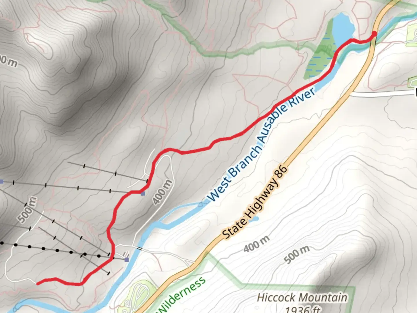 An image depicting the trail Walk along West Branch Ausable River and its surrounding area.