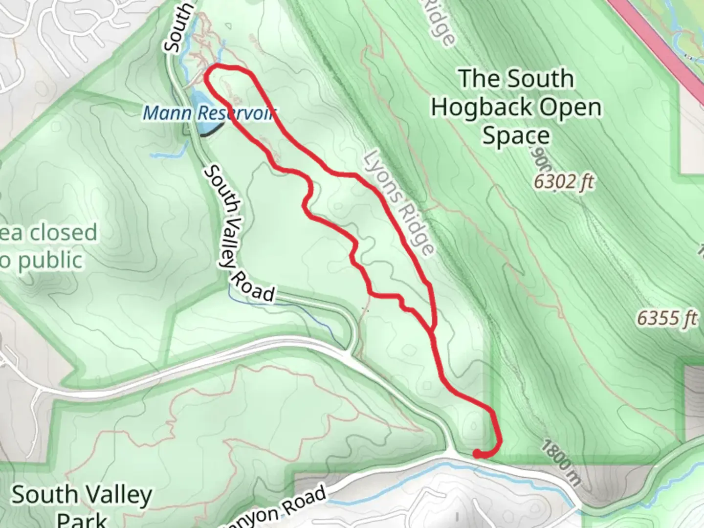An image depicting the trail Mann Reservoir via Coyote Song Loop Trail and its surrounding area.