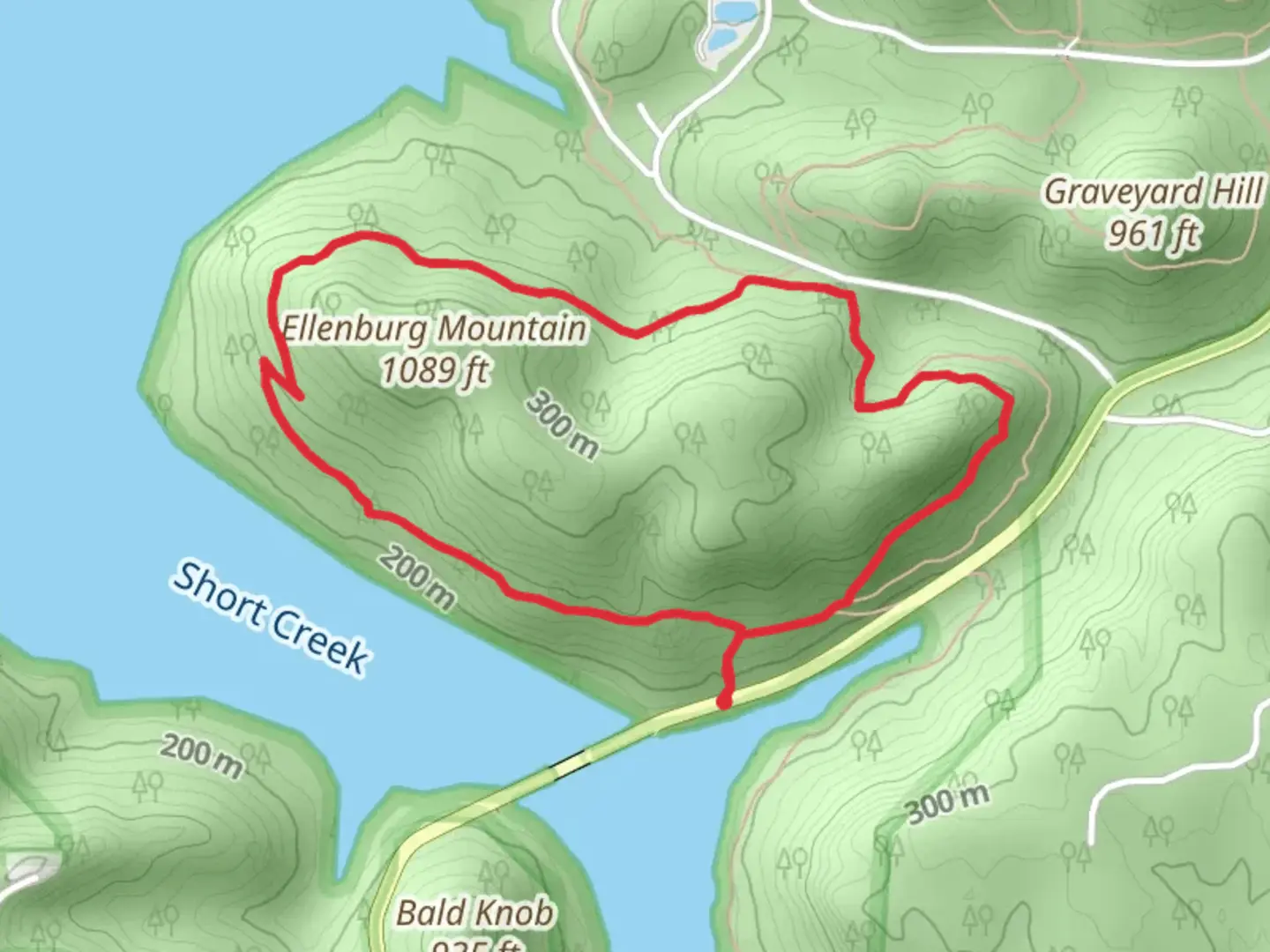 An image depicting the trail Tom Bevill Trail Loop - Ellenburg Mountain and its surrounding area.
