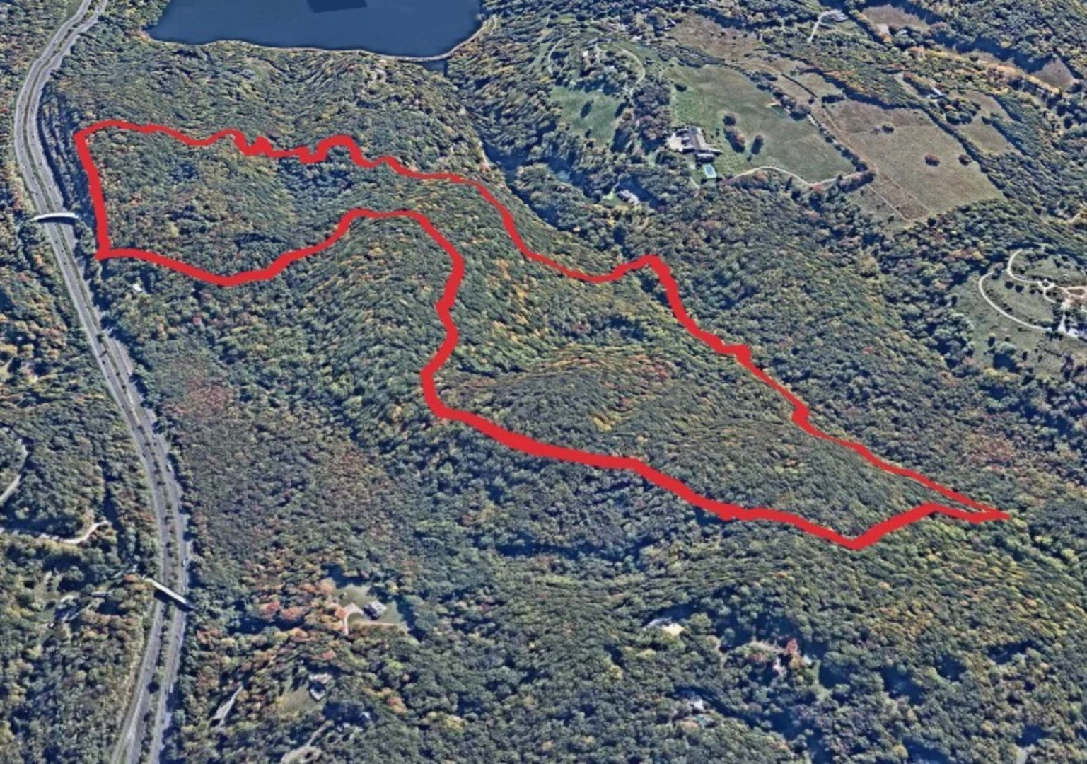 An image depicting the trail Red Trail Yellow Trail Loop - Butler Sancturary and its surrounding area.
