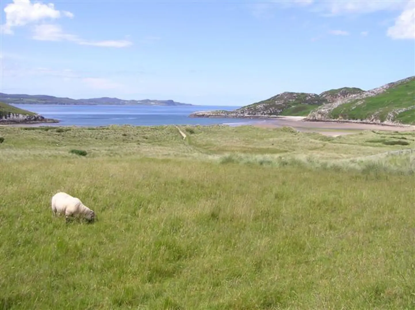 An image depicting the trail Croaghcarragh, Crockmain and Raghtin More Walk from Dunree Bay and its surrounding area.