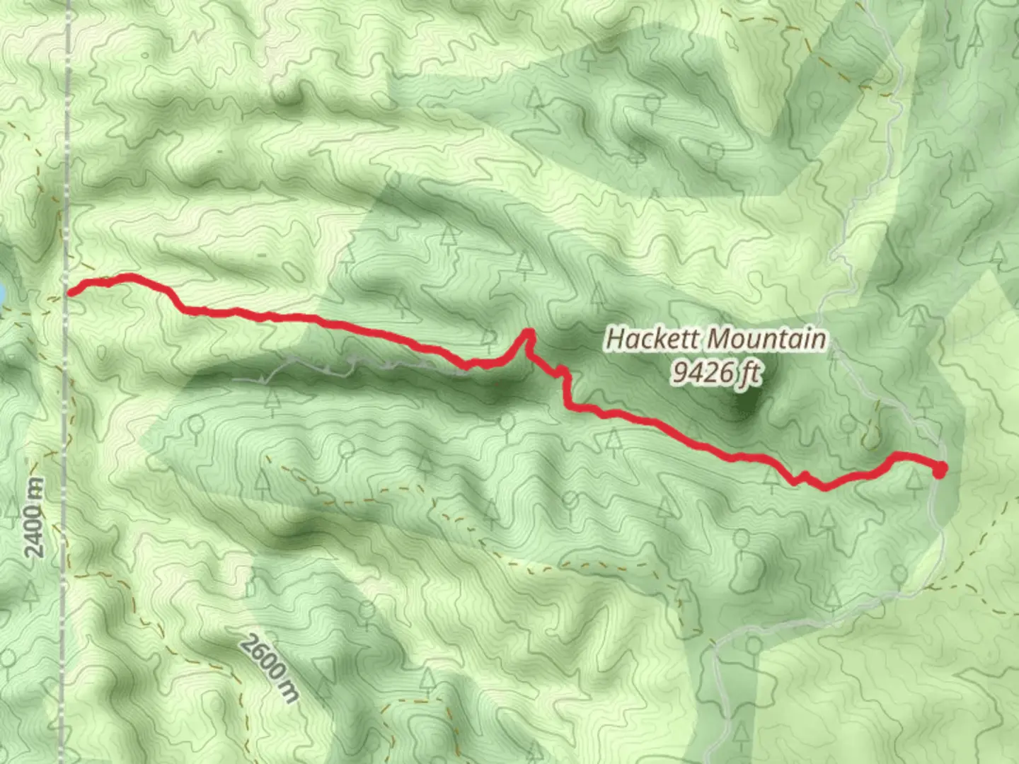 An image depicting the trail Hackett Gulch via Country Road Hackett and its surrounding area.