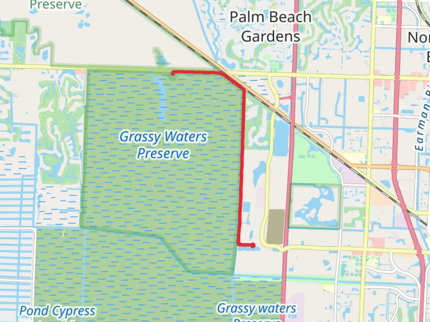 An image depicting the trail Grassy Waters Preserve via Owahee Trail and its surrounding area.