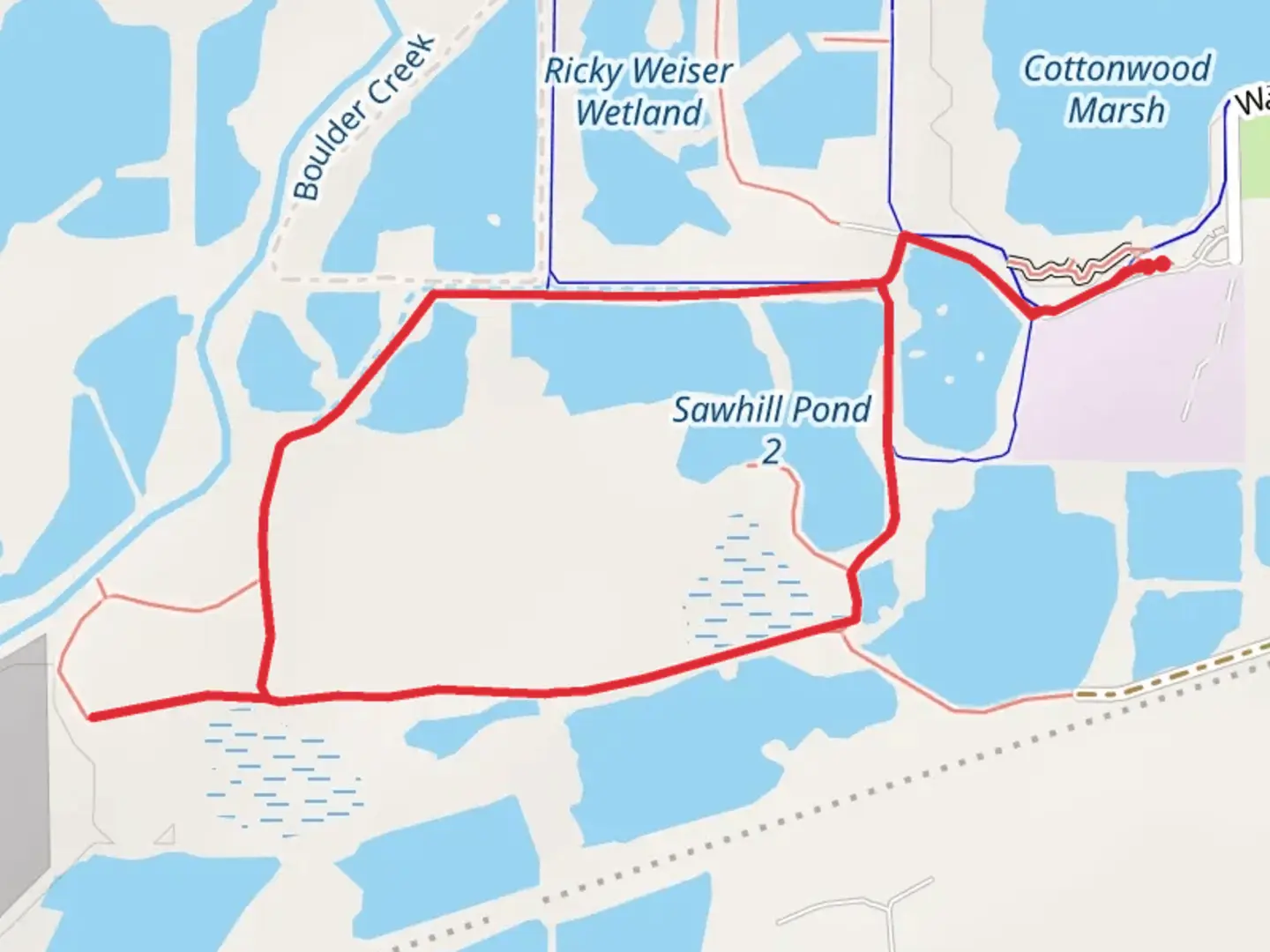 An image depicting the trail Sawhill Ponds Loop and its surrounding area.