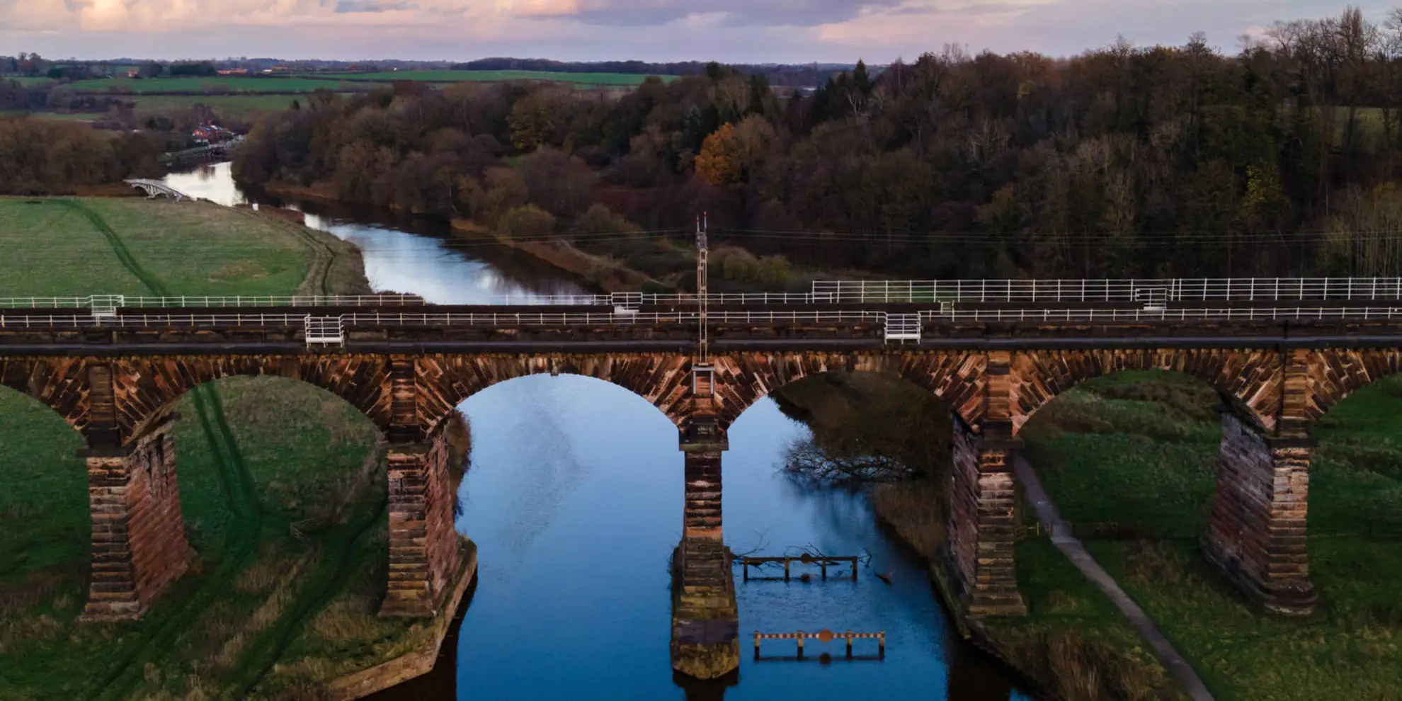An image depicting the trail Acton Bridge - Woodhouse Hill and the River Weaver and its surrounding area.