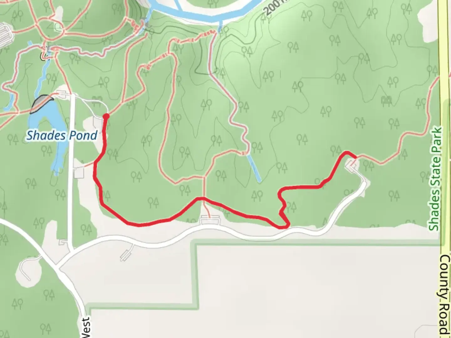 An image depicting the trail Walk near Shades Pond and its surrounding area.