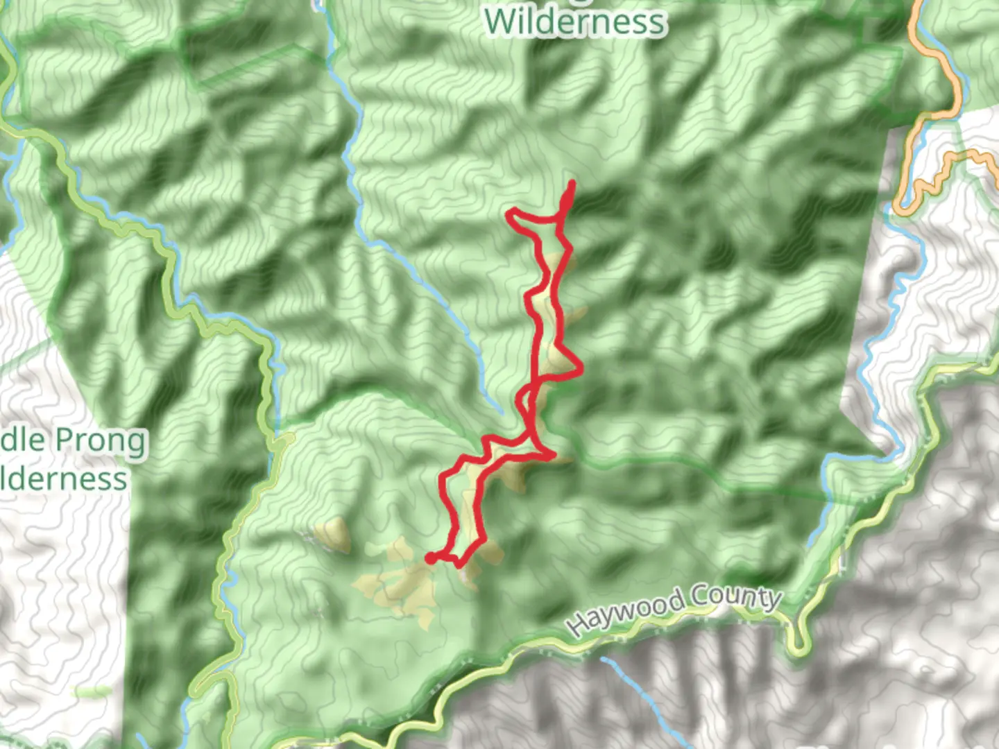 An image depicting the trail Shining Rock, Tennent Mountain, Investor Gap and Art Loed Loop Trail and its surrounding area.