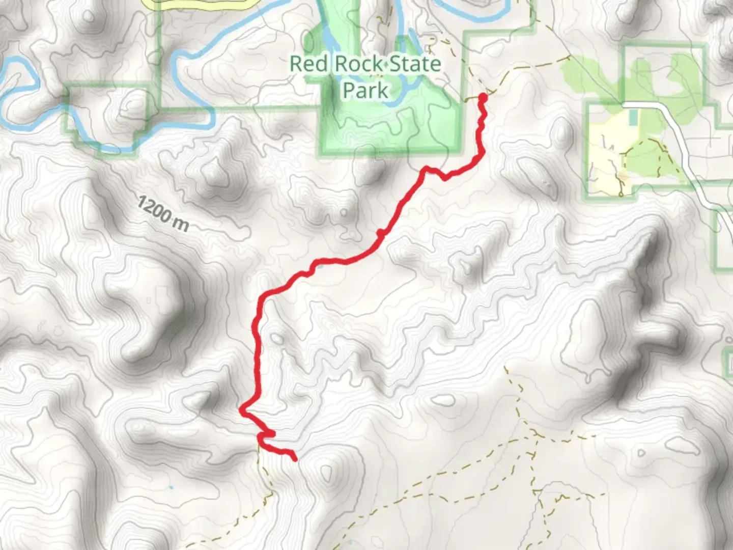 An image depicting the trail Turkey Creek Trail and Turkey Creek Tank and its surrounding area.