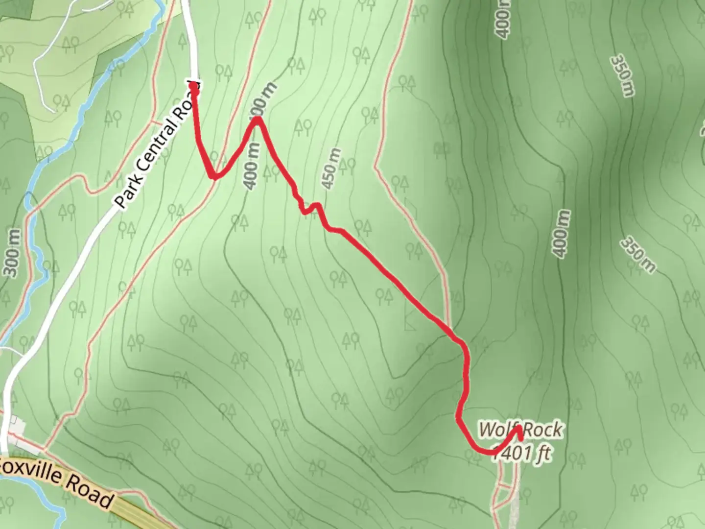 An image depicting the trail Visitor Center-Wolf Rock Trail and its surrounding area.
