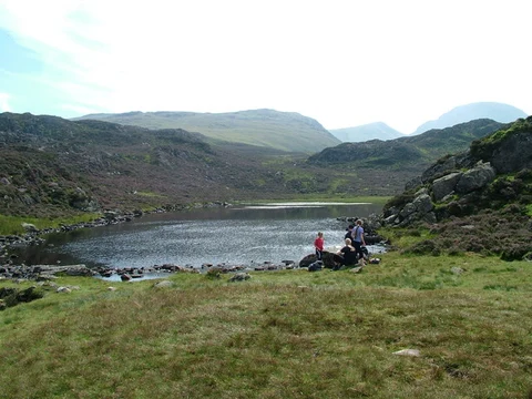 An image depicting the trail Ennerdale Bridge to Rosthwaite Walk via Red Pike and its surrounding area.