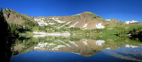 An image depicting the trail Rogers Pass Lake via South Boulder Creek Trail and its surrounding area.