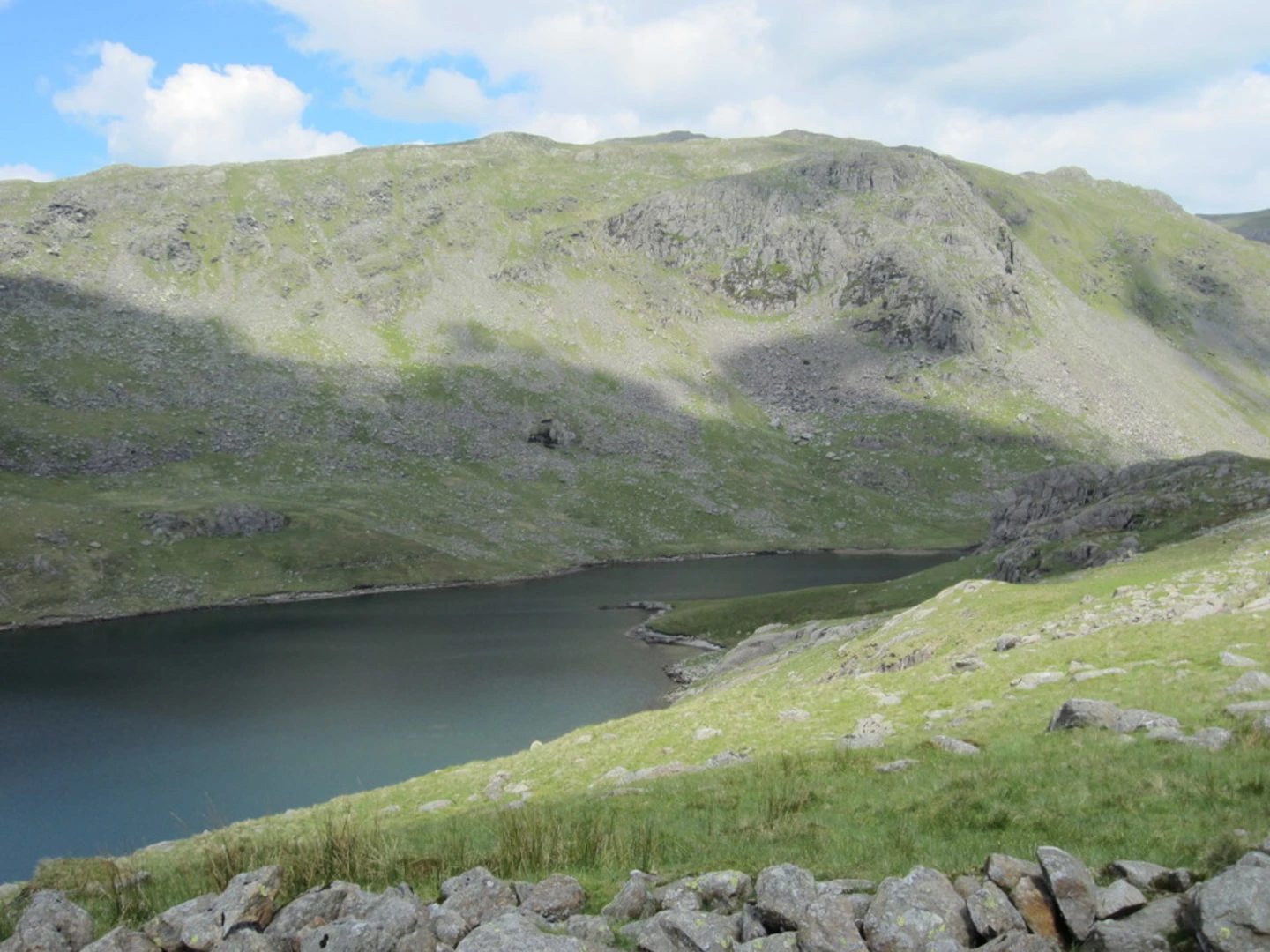 An image depicting the trail Dow Crag and Brim Fell Loop via Seathwaite Tarn and its surrounding area.